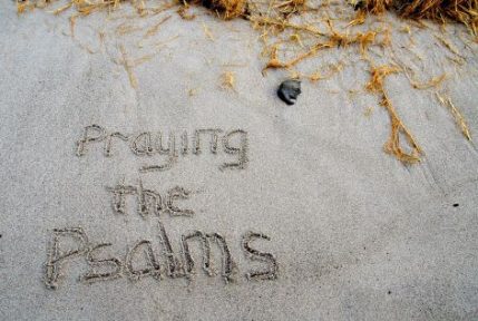 Photo: Praying the Psalms written in the sand